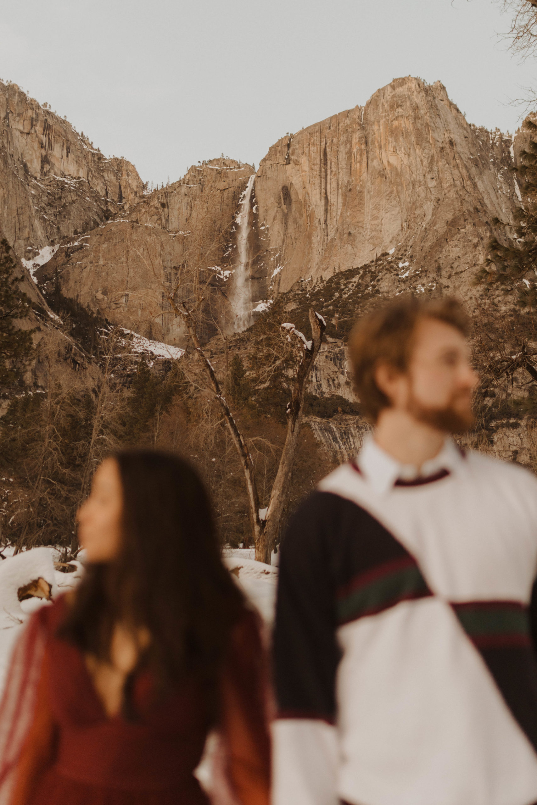 Couple in love in front of waterfall in Yosemite National Park,CA