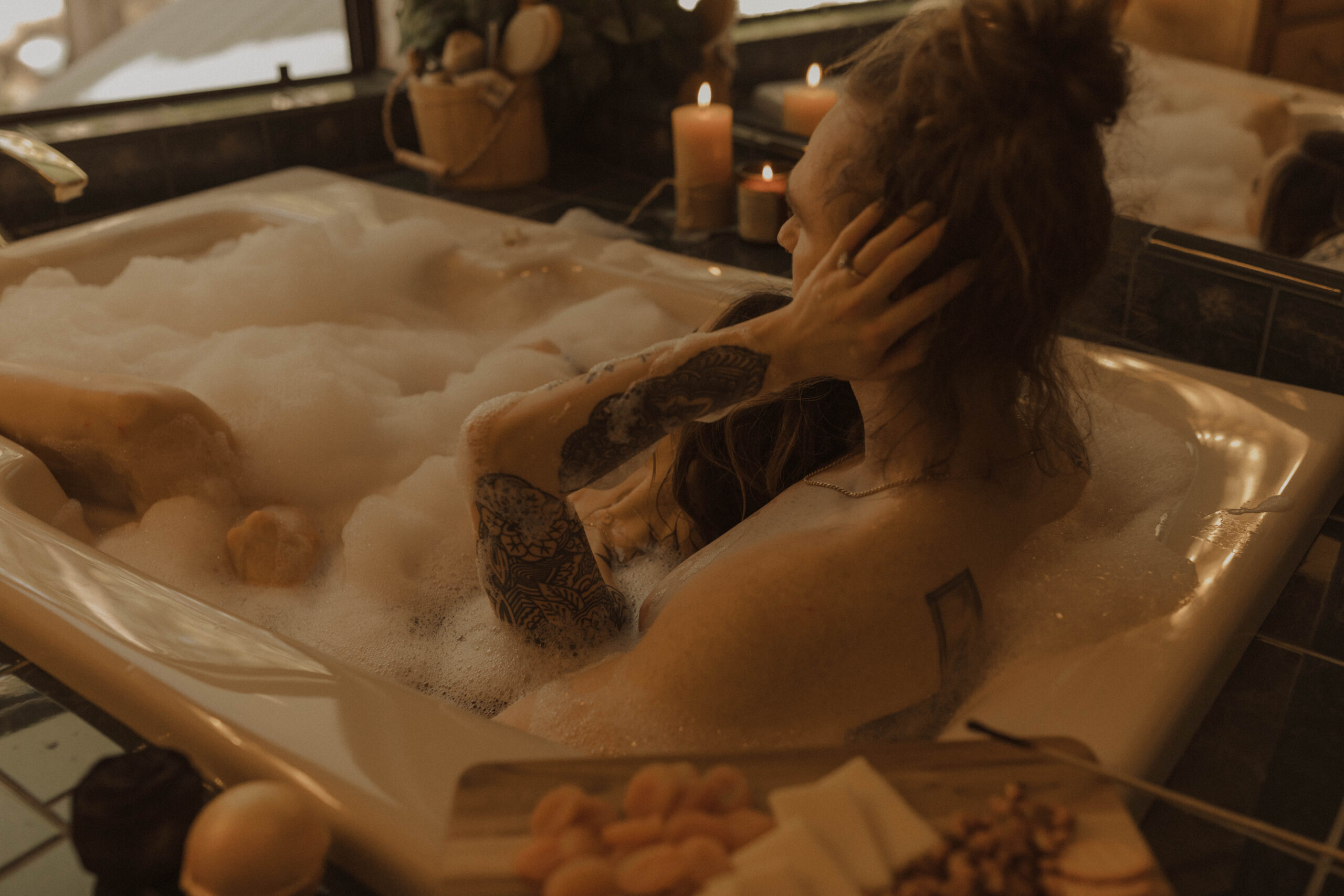 Couples boudoir session in the bathtub
