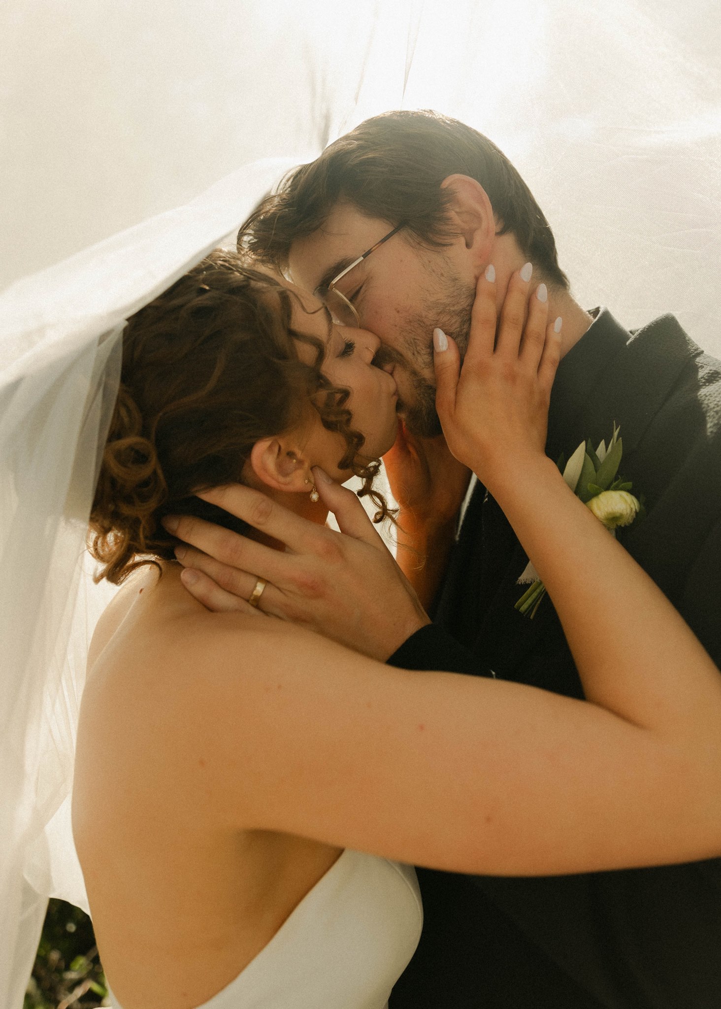 Bride and groom sharing an intimate moment at their California wedding