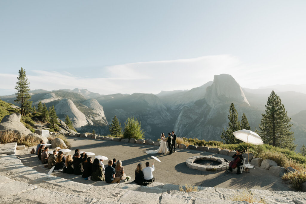 Intimate micro wedding ceremony at Glacier Point overlooking Yosemite National Park
